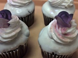 cupcakes purple with glitter dust and rose